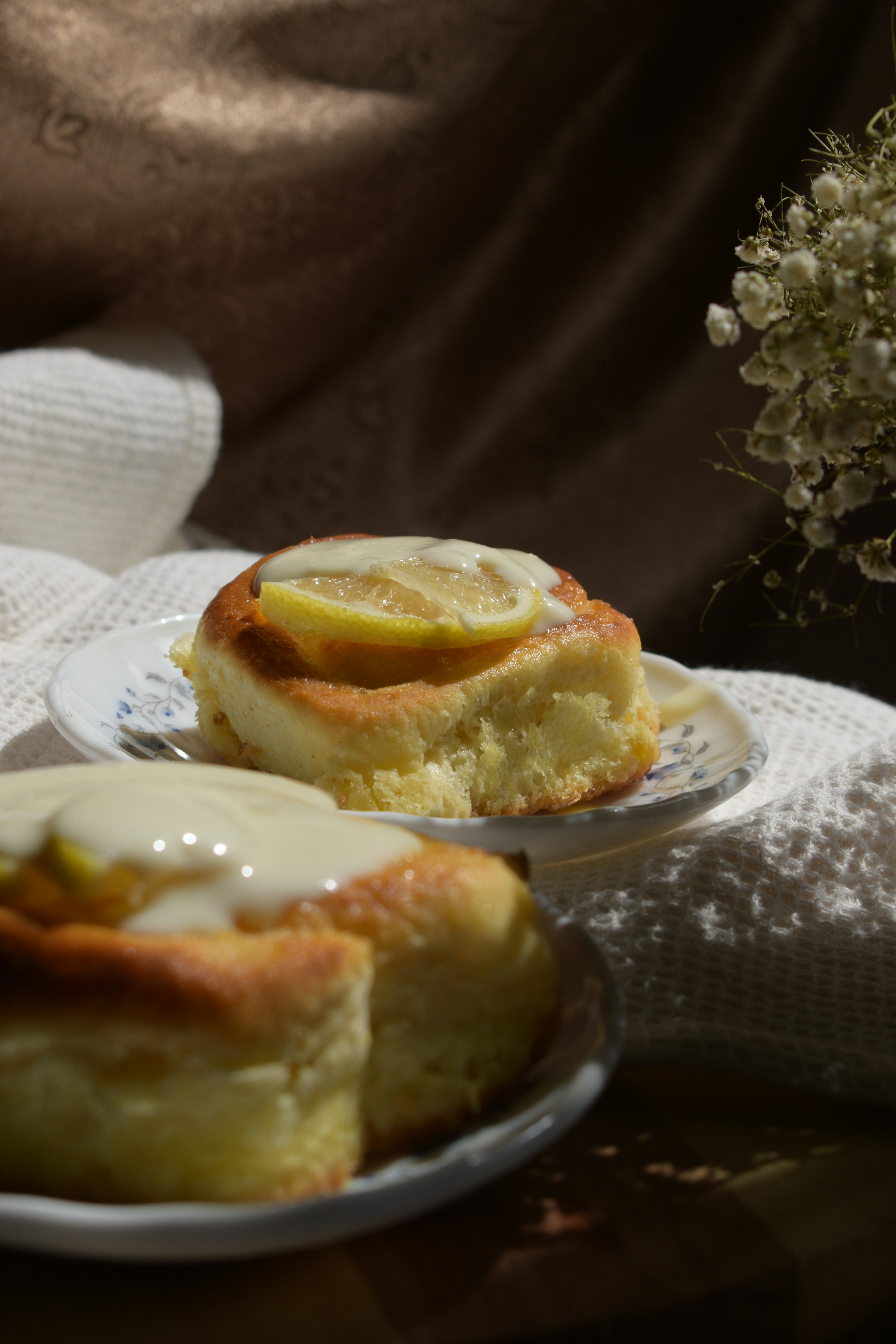 A person sitting at a table with a plate of food