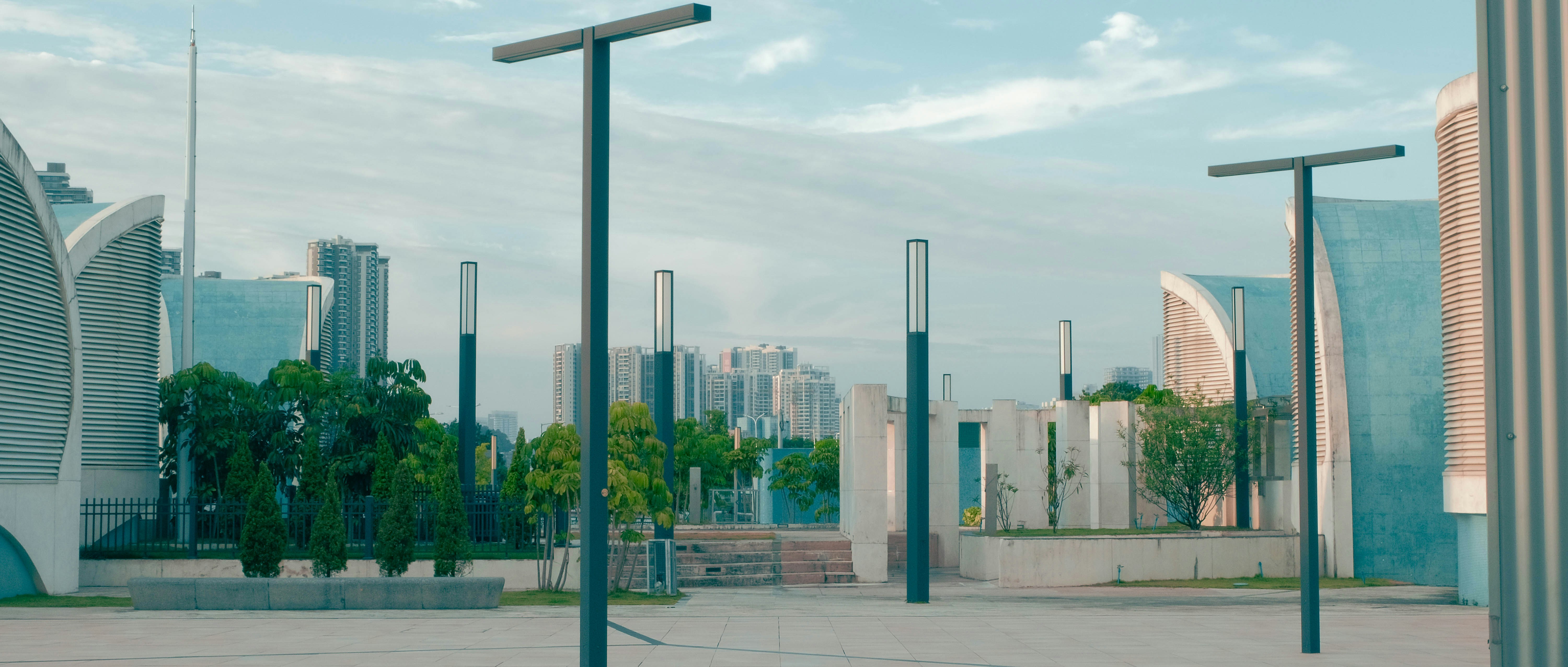 A city street filled with lots of tall buildings