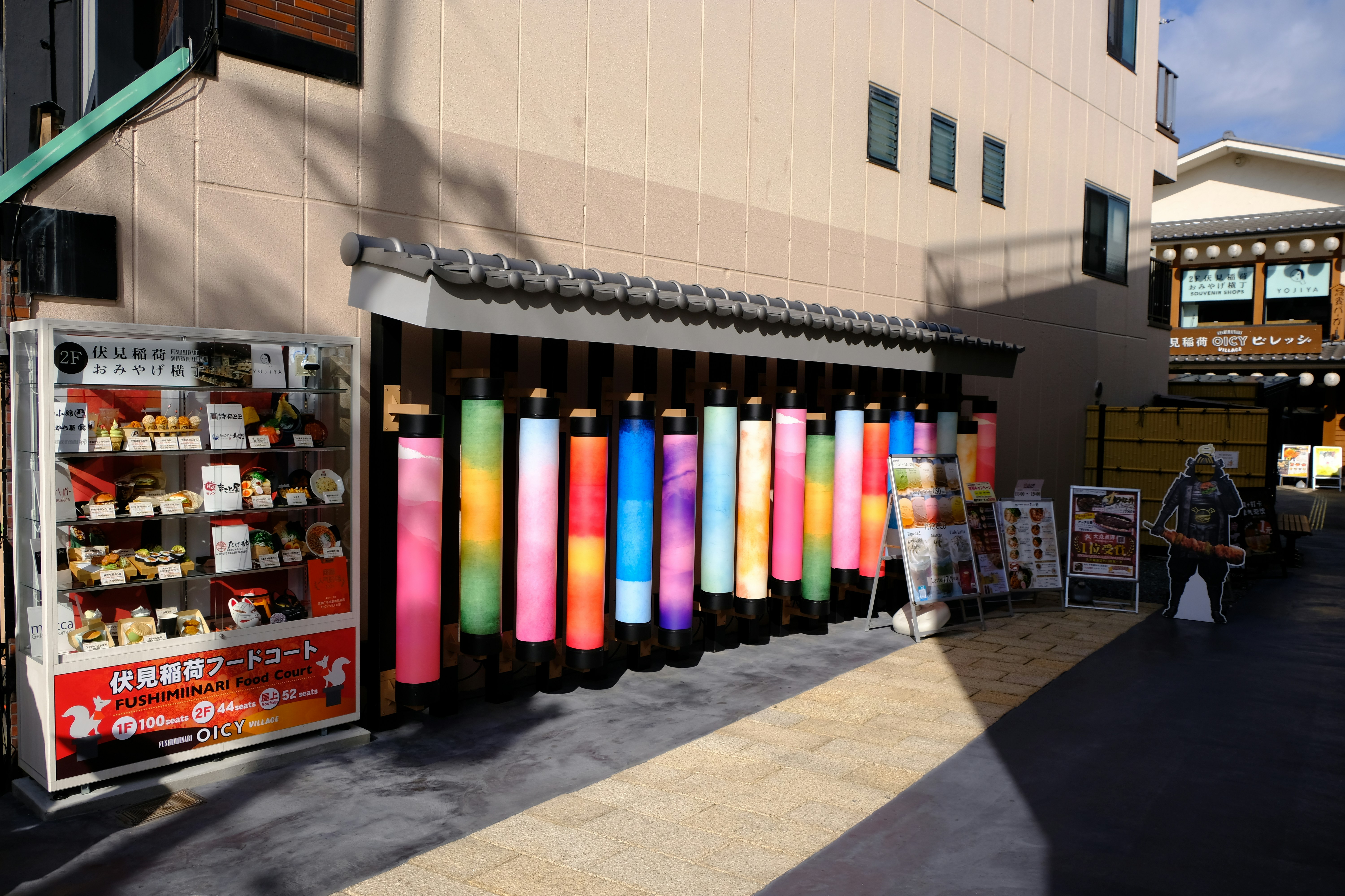 Colorful display of washi paper rolls and sheets in a stationery store