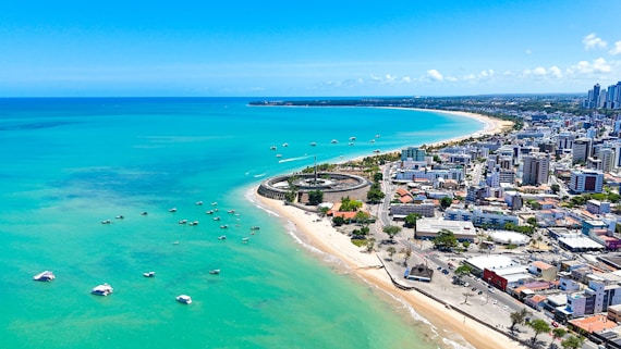 An aerial view of a city and the ocean