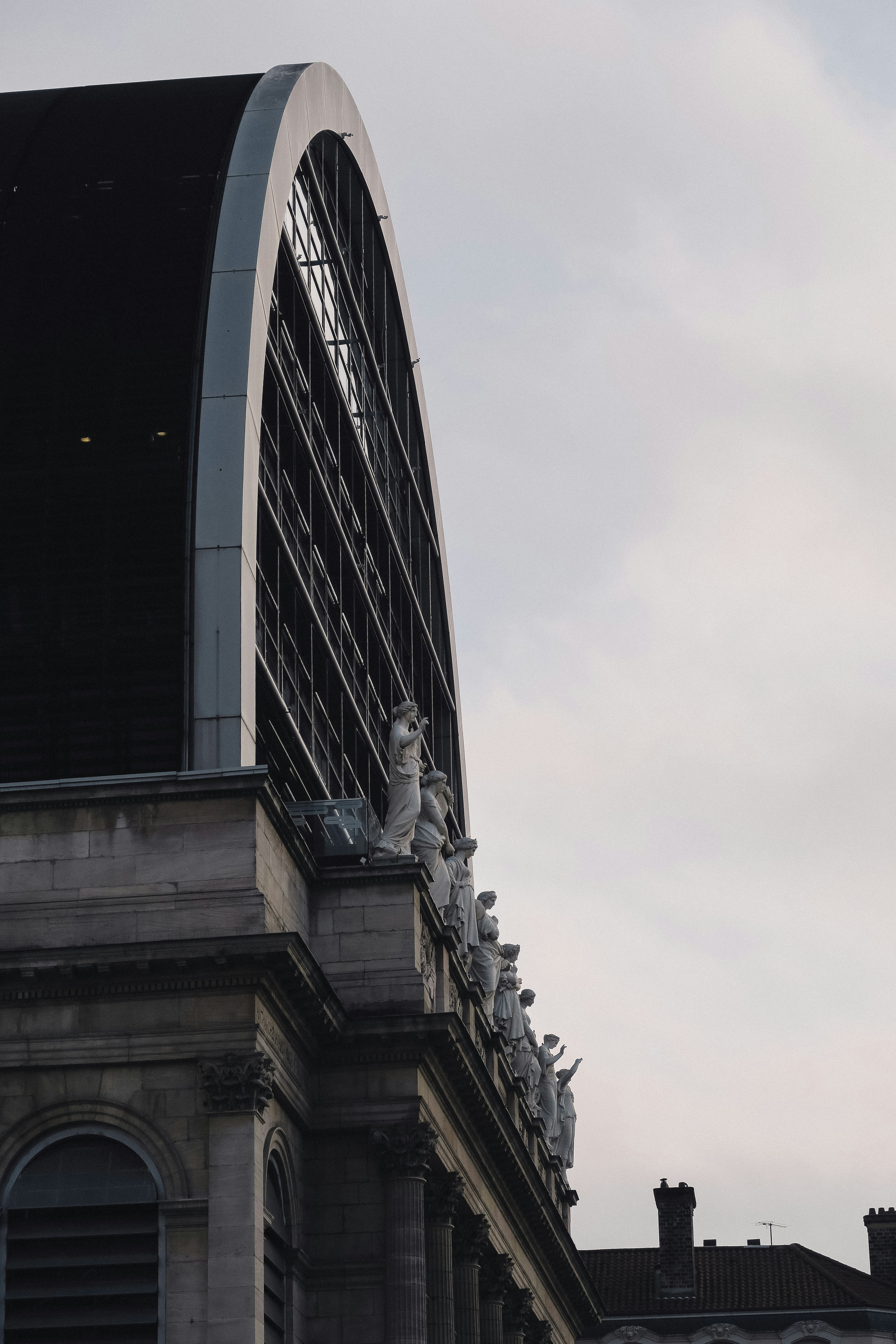 A tall building with a clock on the side of it