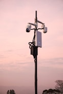 A street light with two cameras attached to it