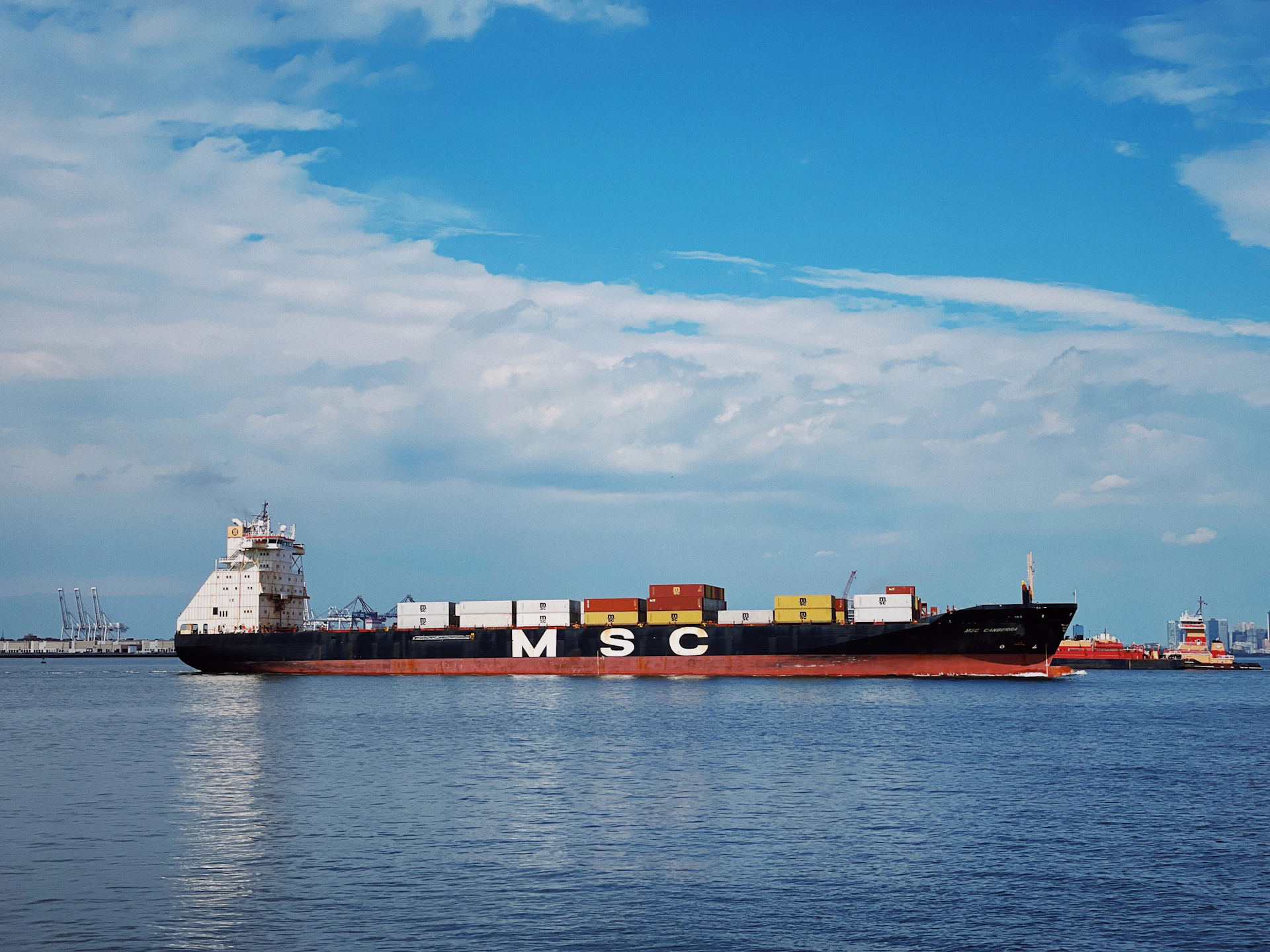 A large cargo ship in the middle of the ocean