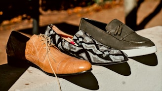 A couple of shoes that are sitting on a table