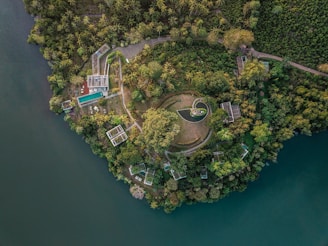 An aerial view of a lake surrounded by trees