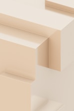 A close up of a wall with a clock on it