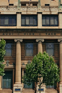 A large building with a clock on the front of it