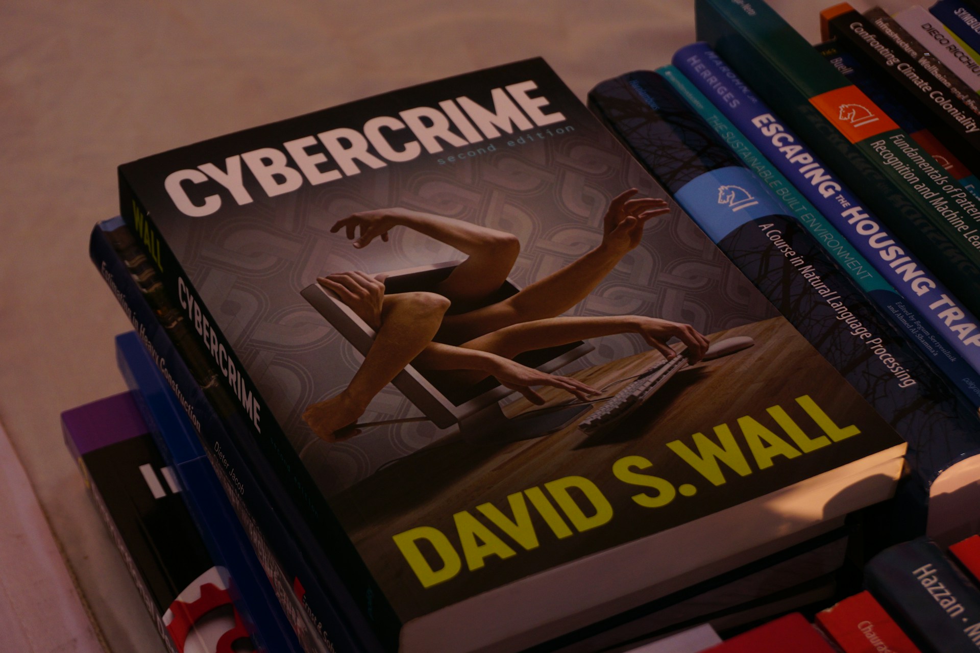 A stack of books sitting on top of a table