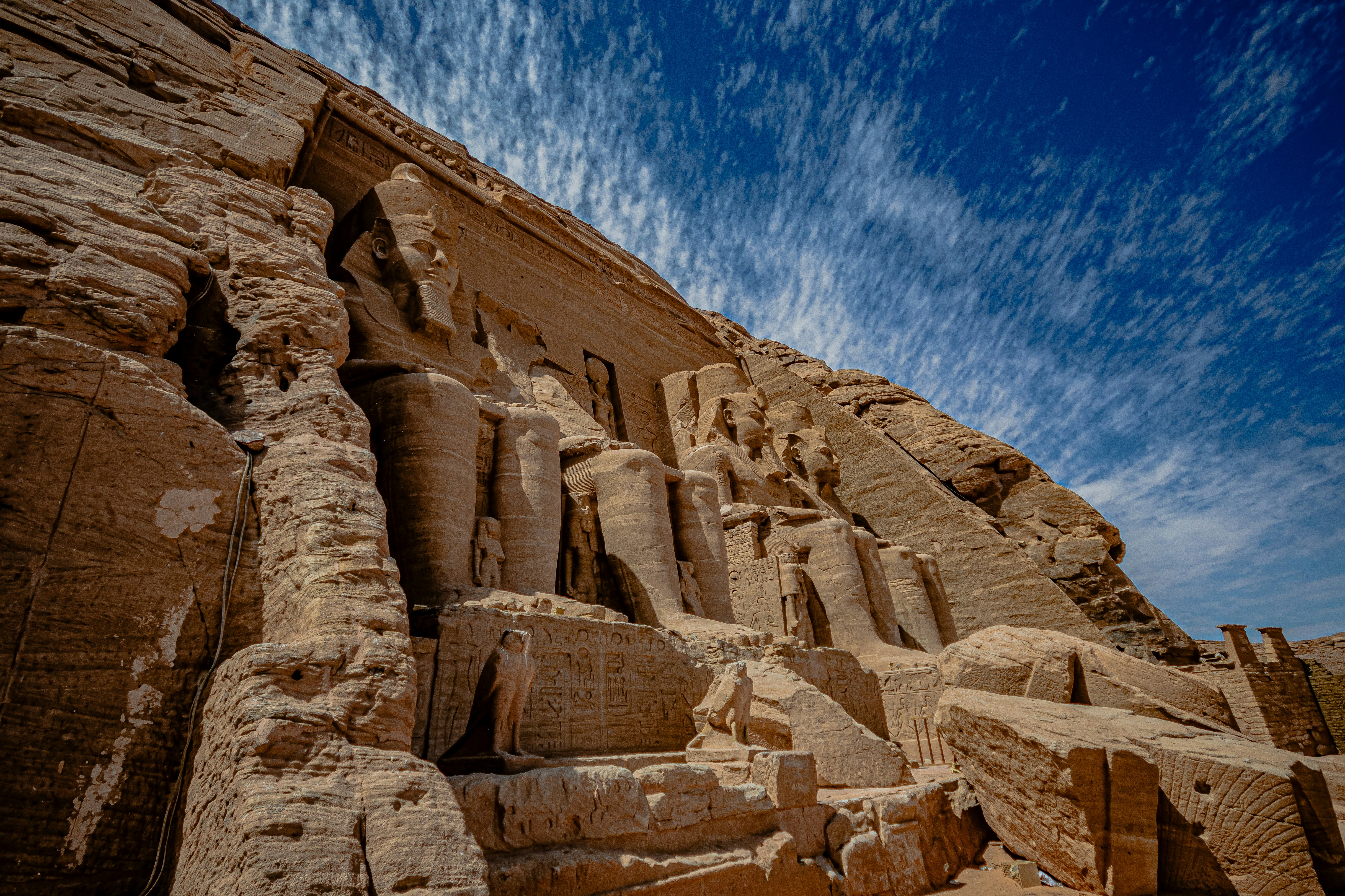 A large stone structure with a sky in the background
