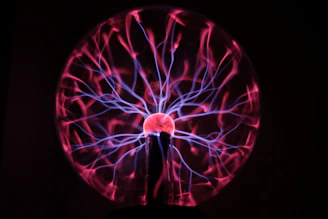 A close up of a spinning object in the dark