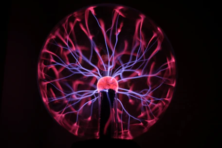 A close up of a spinning object in the dark