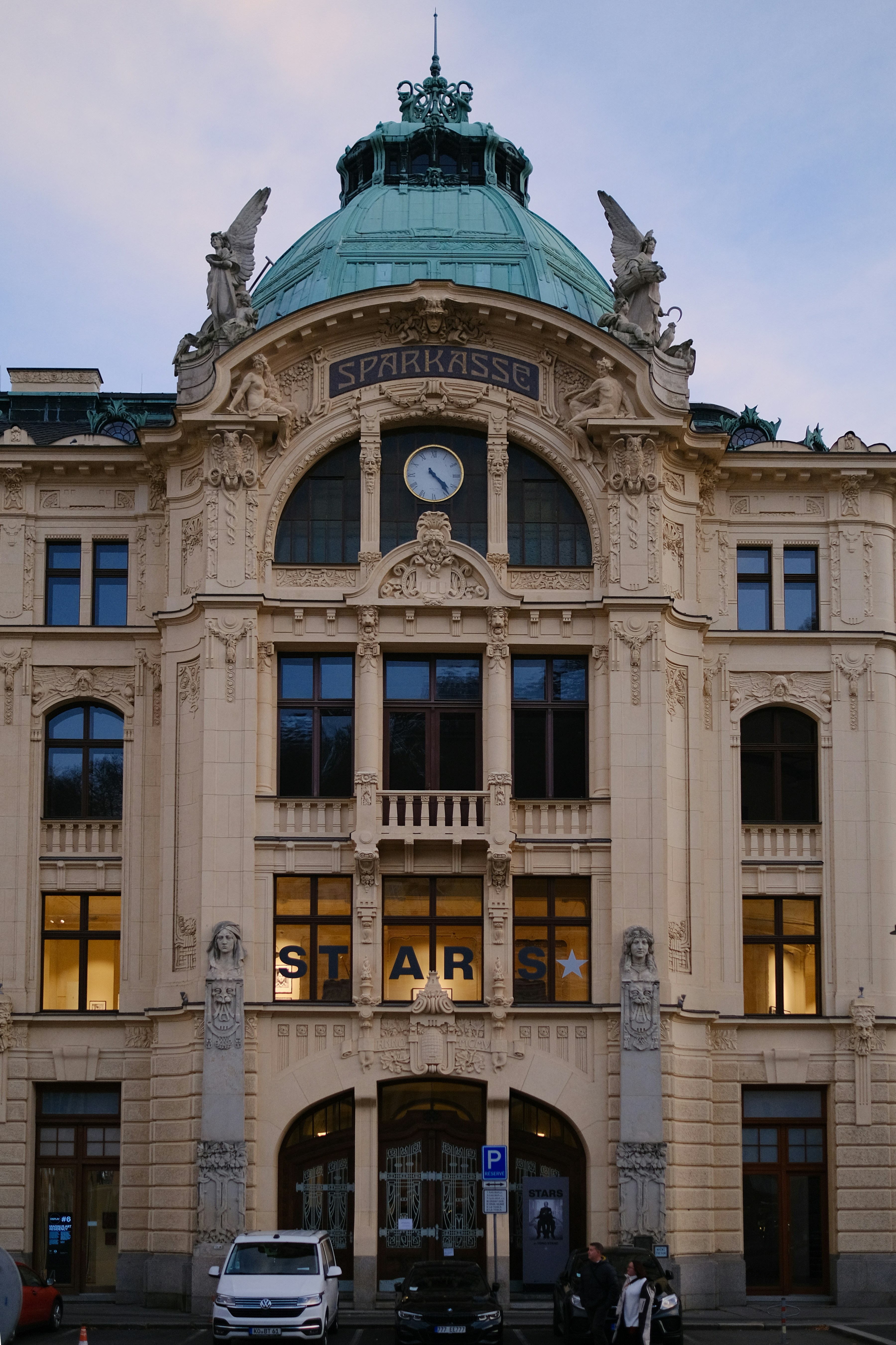 A large building with a clock on the top of it