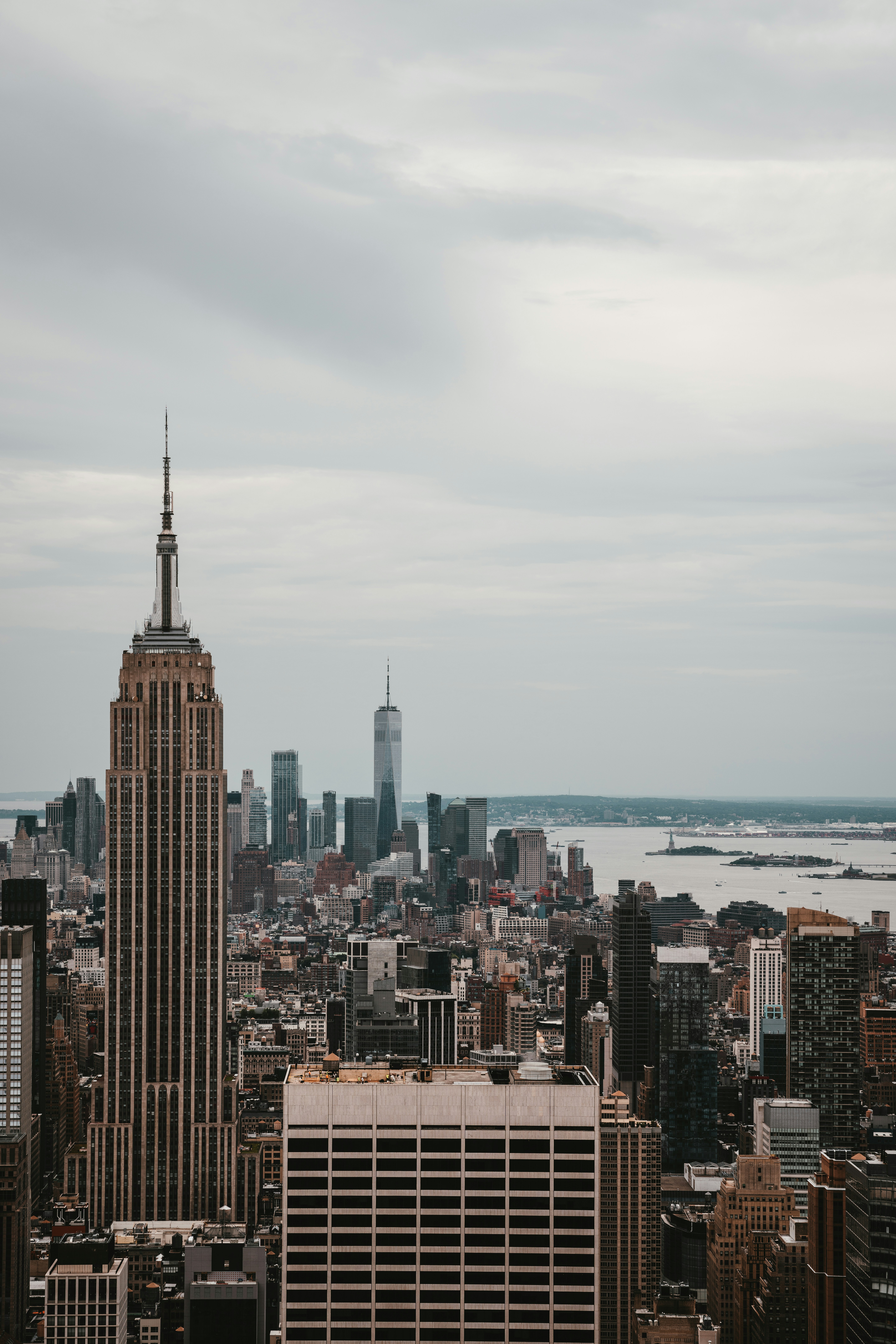 A view of a city from the top of a building