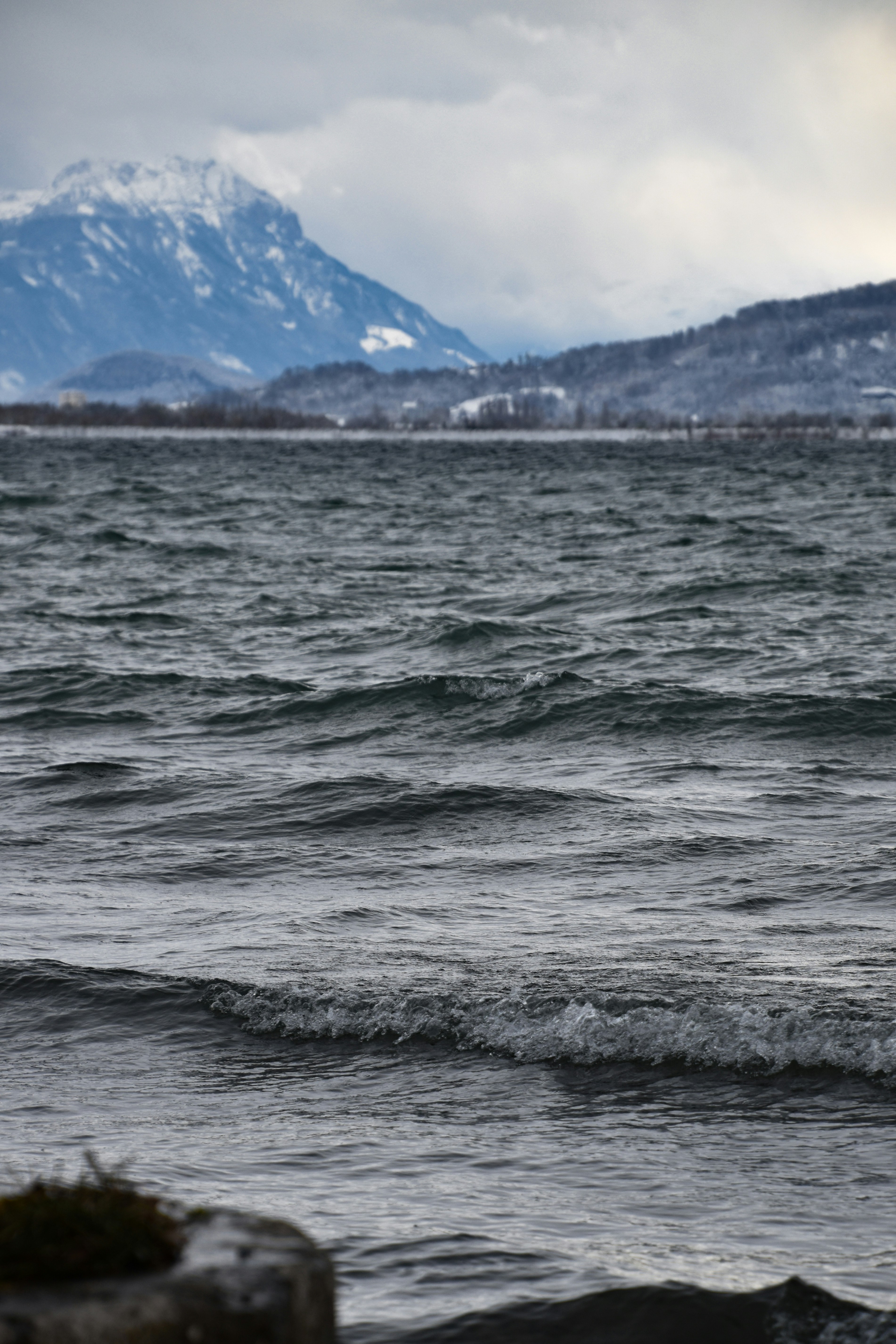A person riding a surf board on a body of water