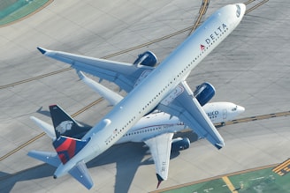 A large jetliner sitting on top of an airport tarmac