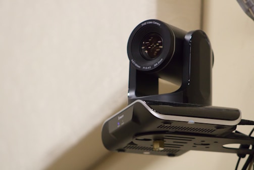 A camera attached to the side of a wall