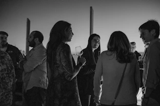 A group of people standing next to each other