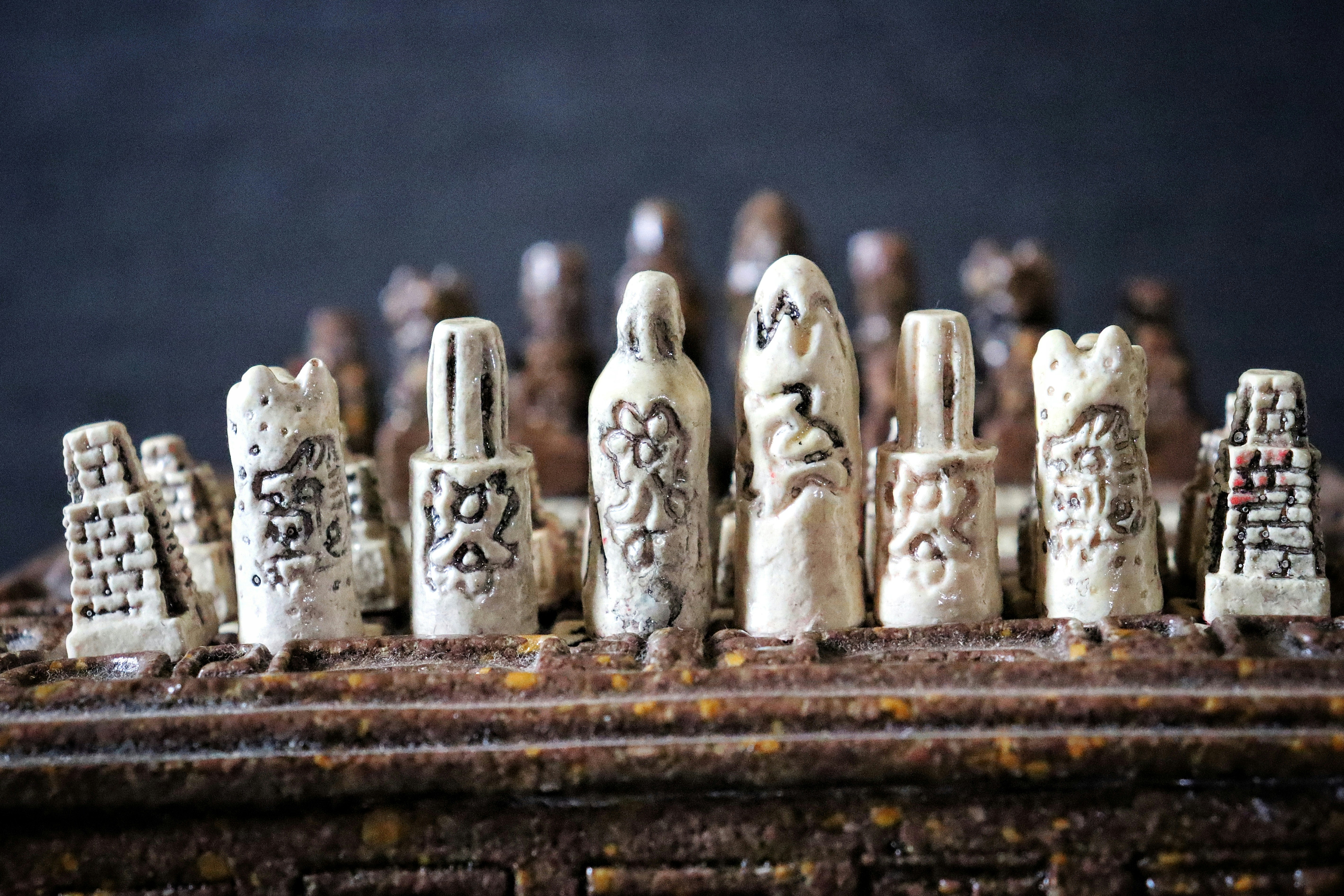 A close up of a group of ceramic figurines