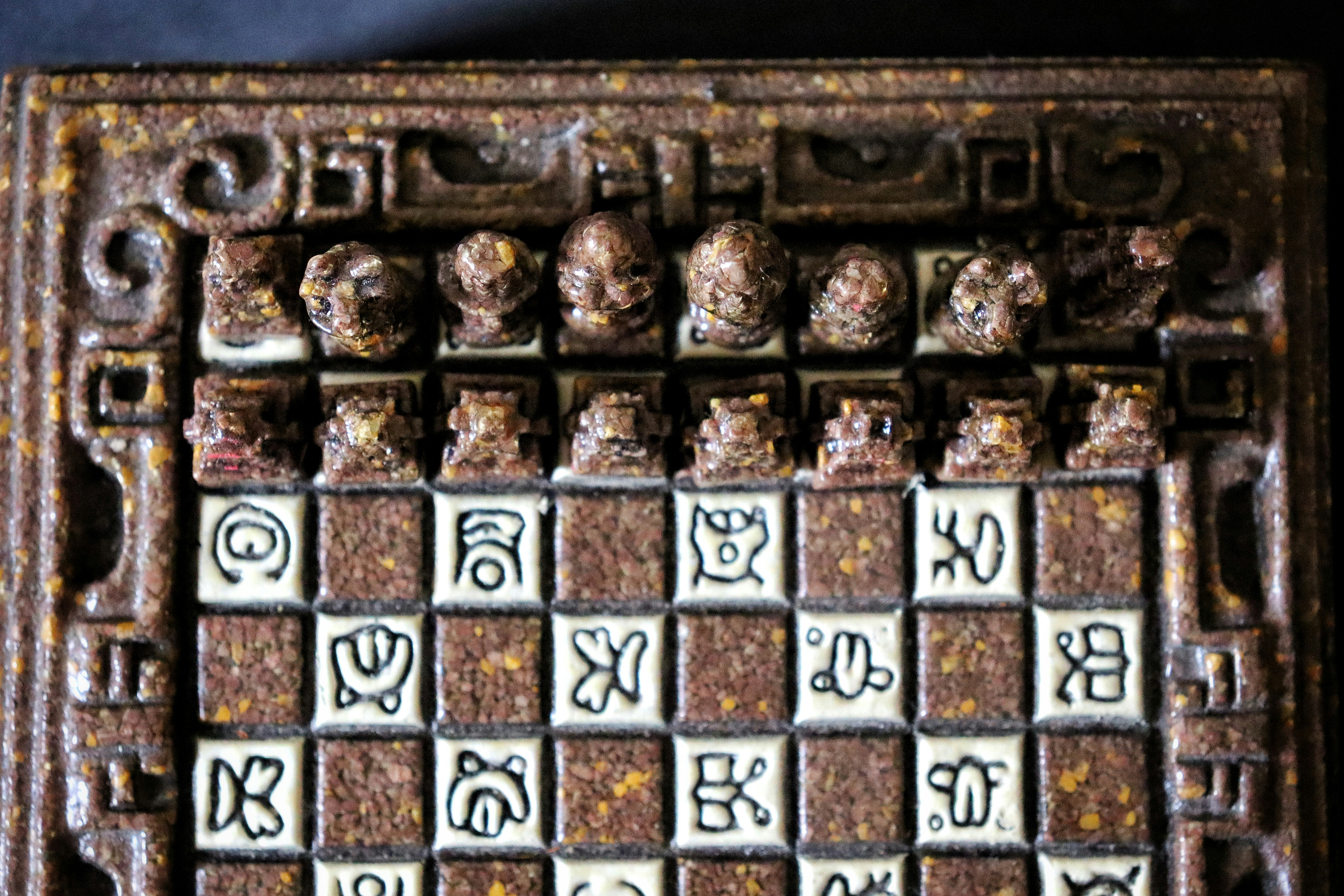 Close-up of a metal grate with writing