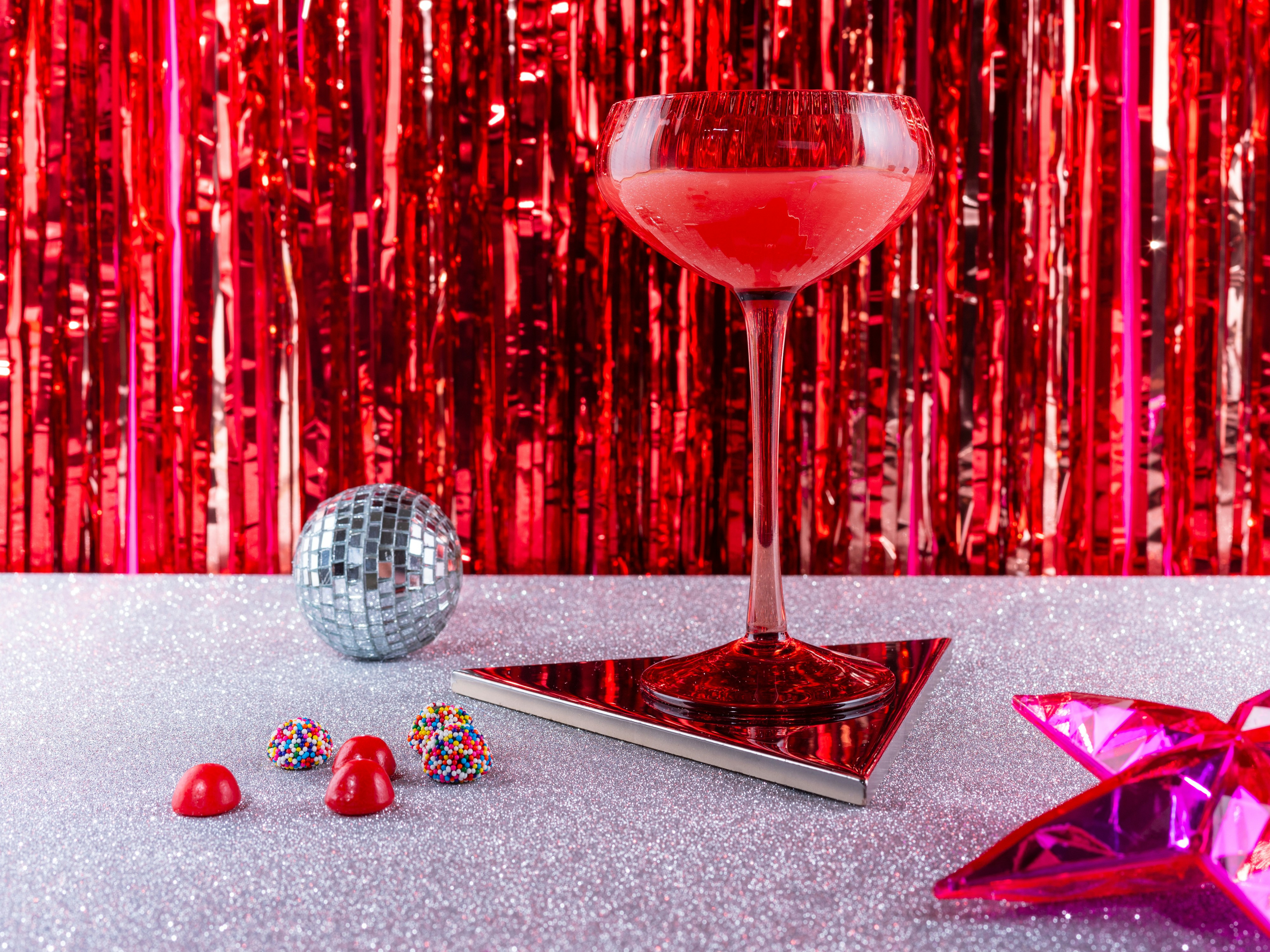 A glass of wine sitting on top of a table