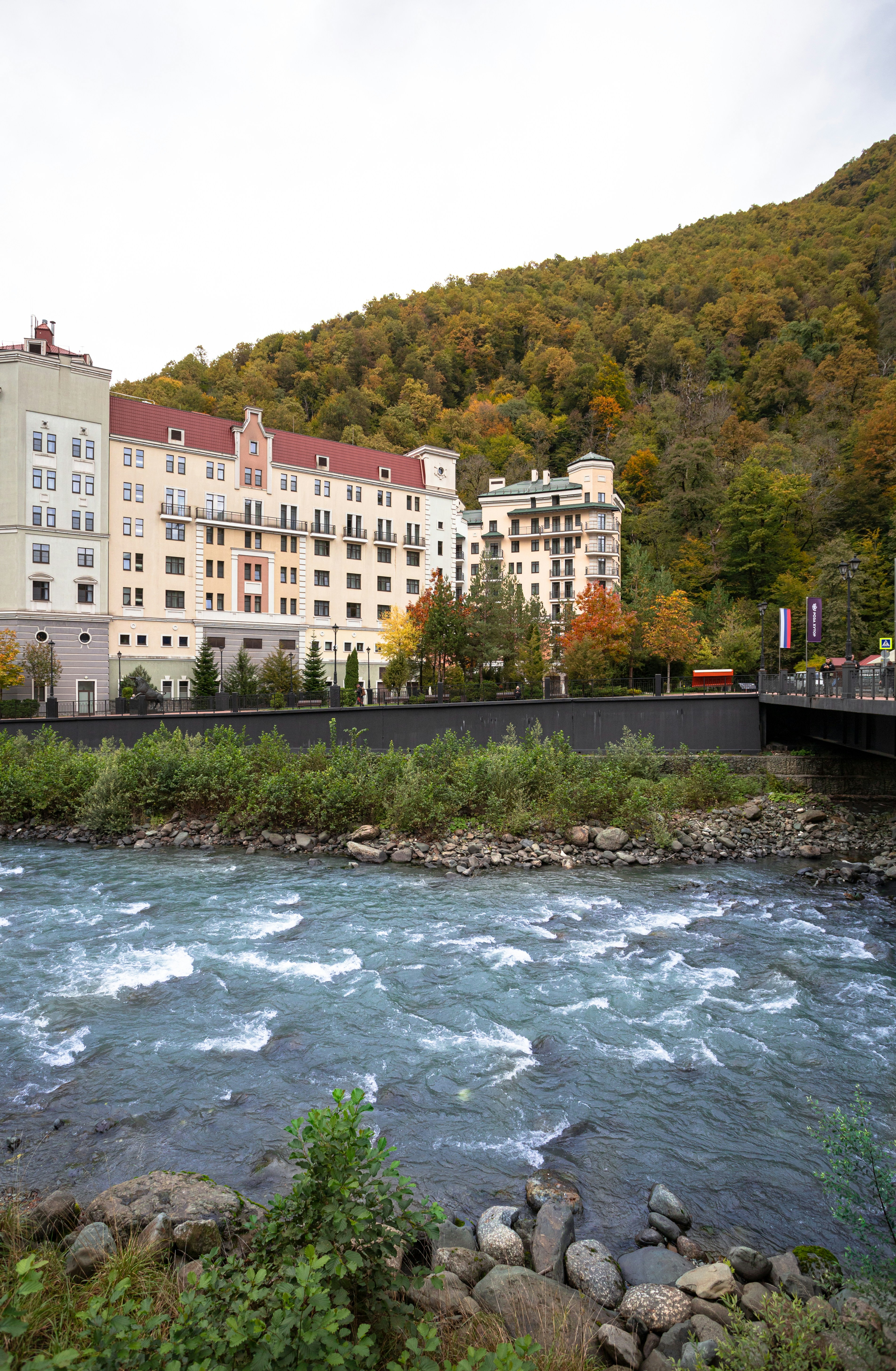 A river running through a lush green hillside