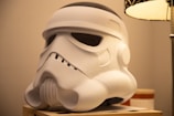 A lamp that has a storm trooper helmet on it