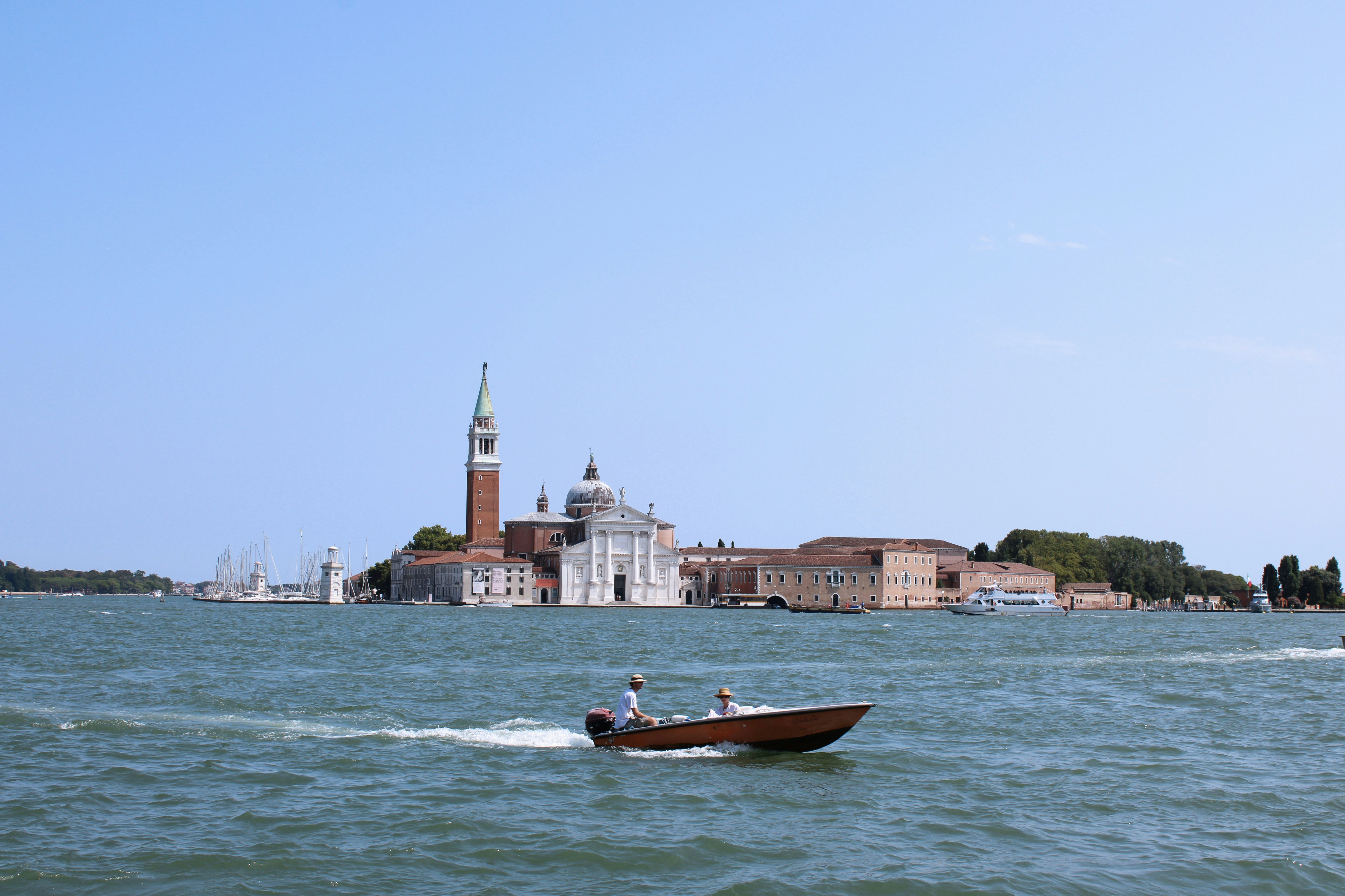 A small boat in a large body of water