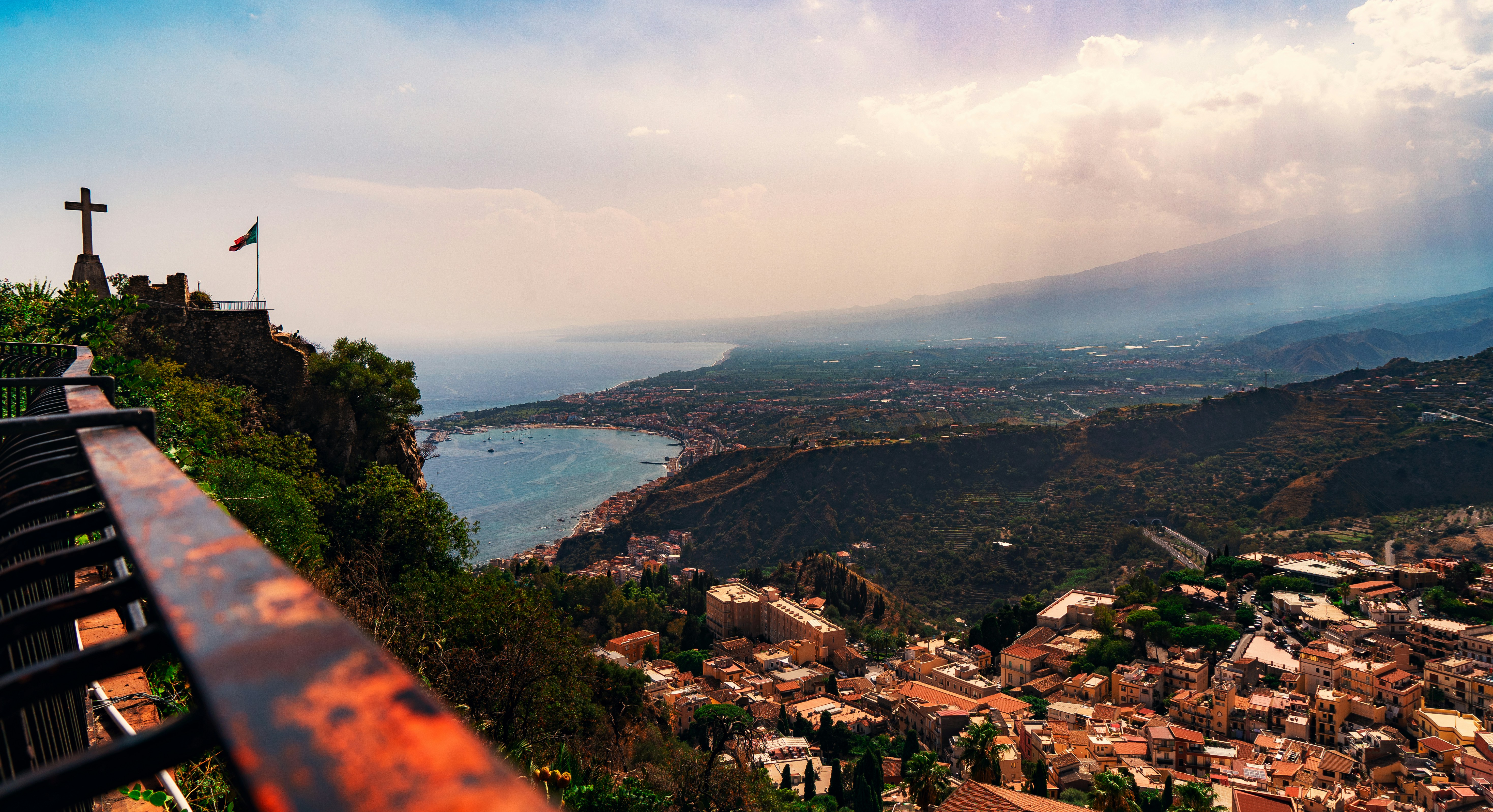 A scenic view of a city and a body of water
