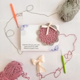 A crochet kit with a crochet heart and a crochet