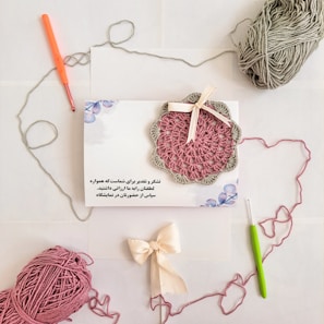 A crochet kit with a crochet heart and a crochet