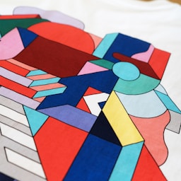 A close up of a piece of art on a table