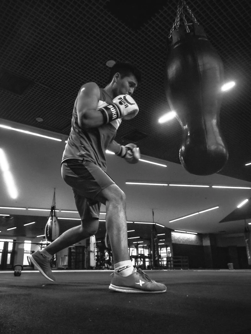 Boxer training on a heavy bag