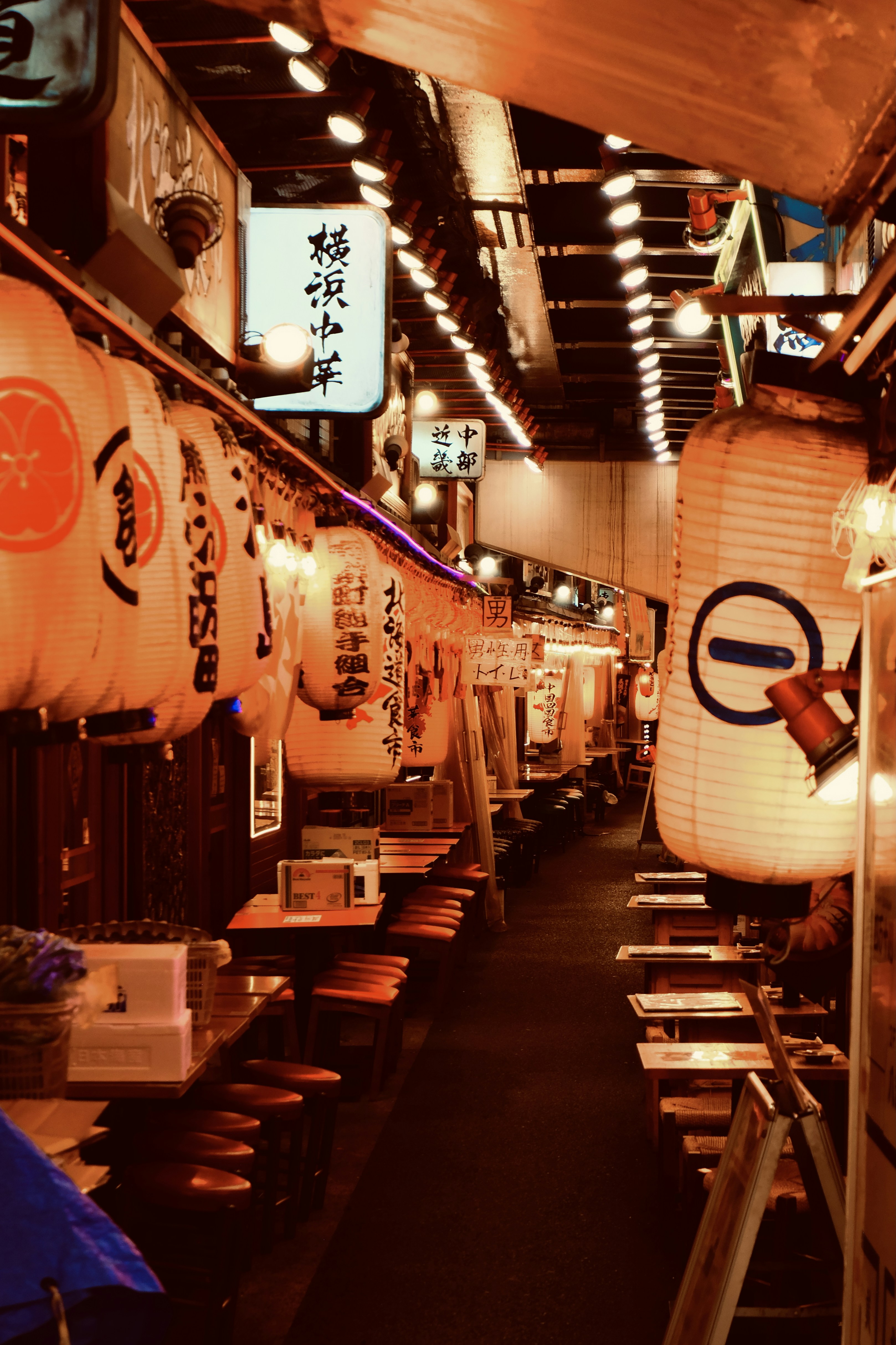 A restaurant filled with lots of tables and chairs