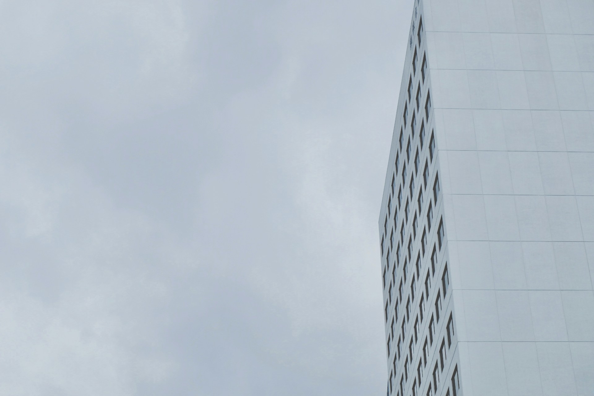 A tall building with a clock on the side of it