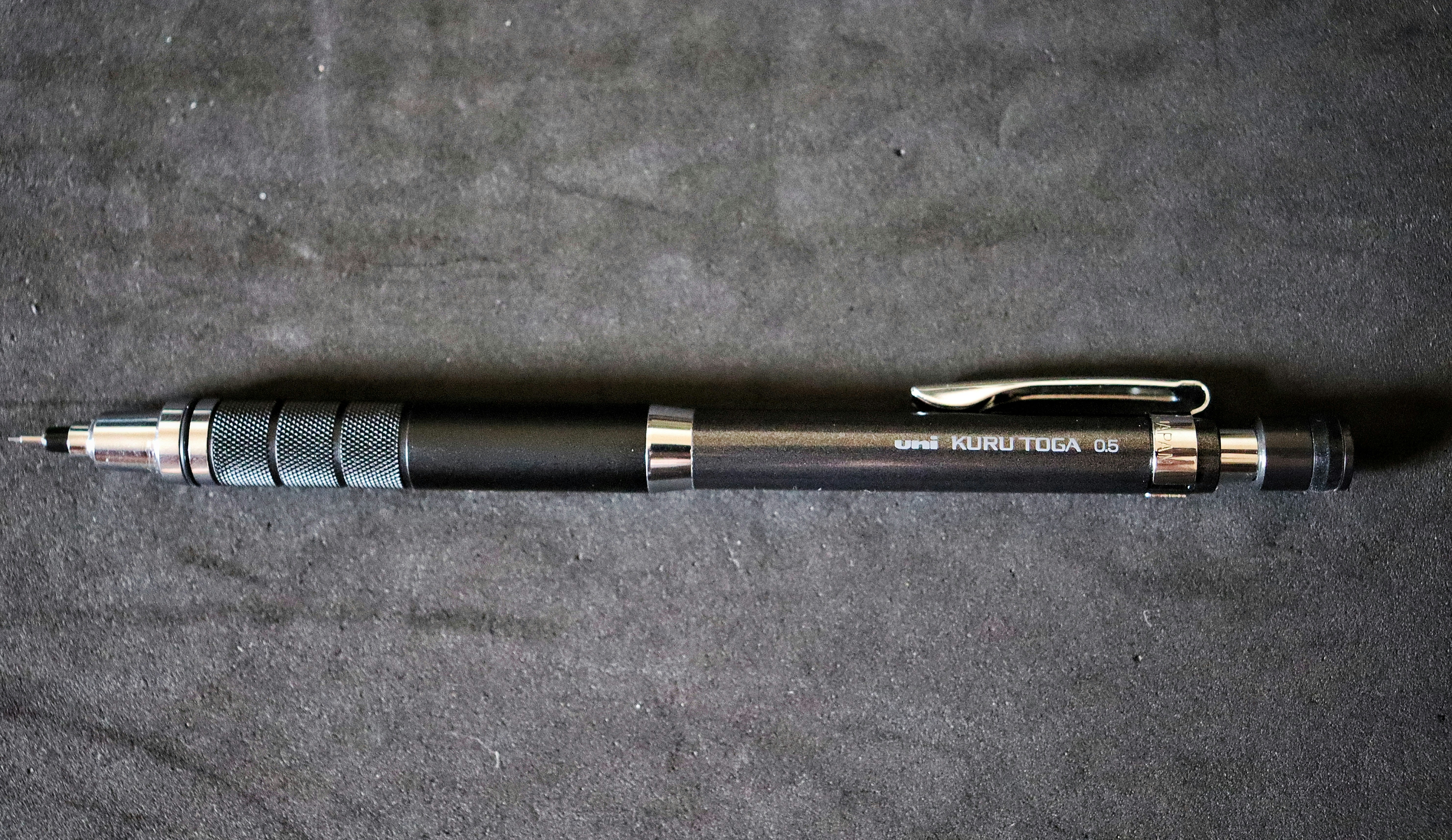 A pen sitting on top of a table