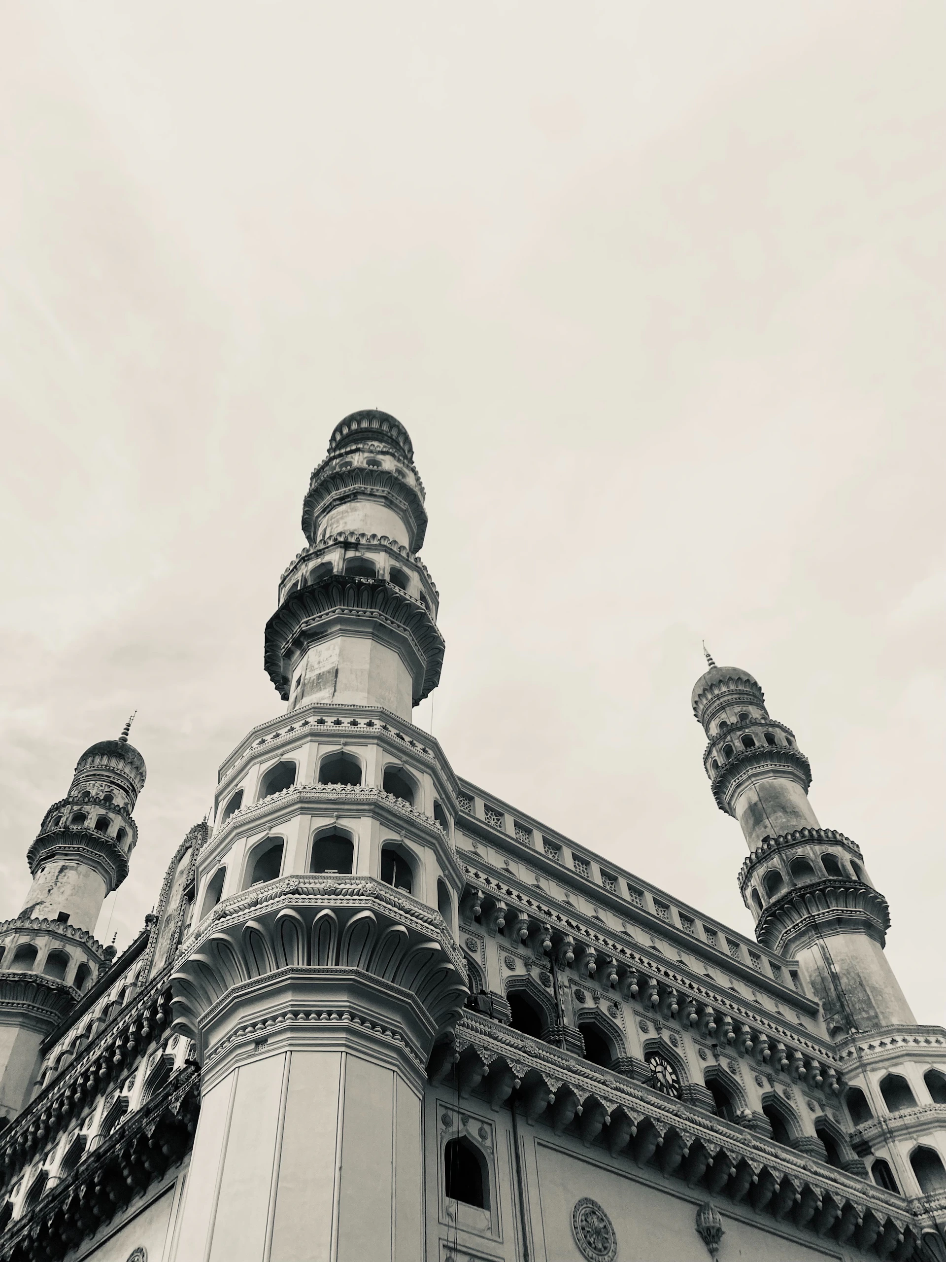 A black and white photo of a tall building