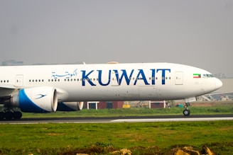 A large jetliner sitting on top of an airport runway