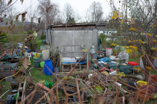 A yard full of trash and other items