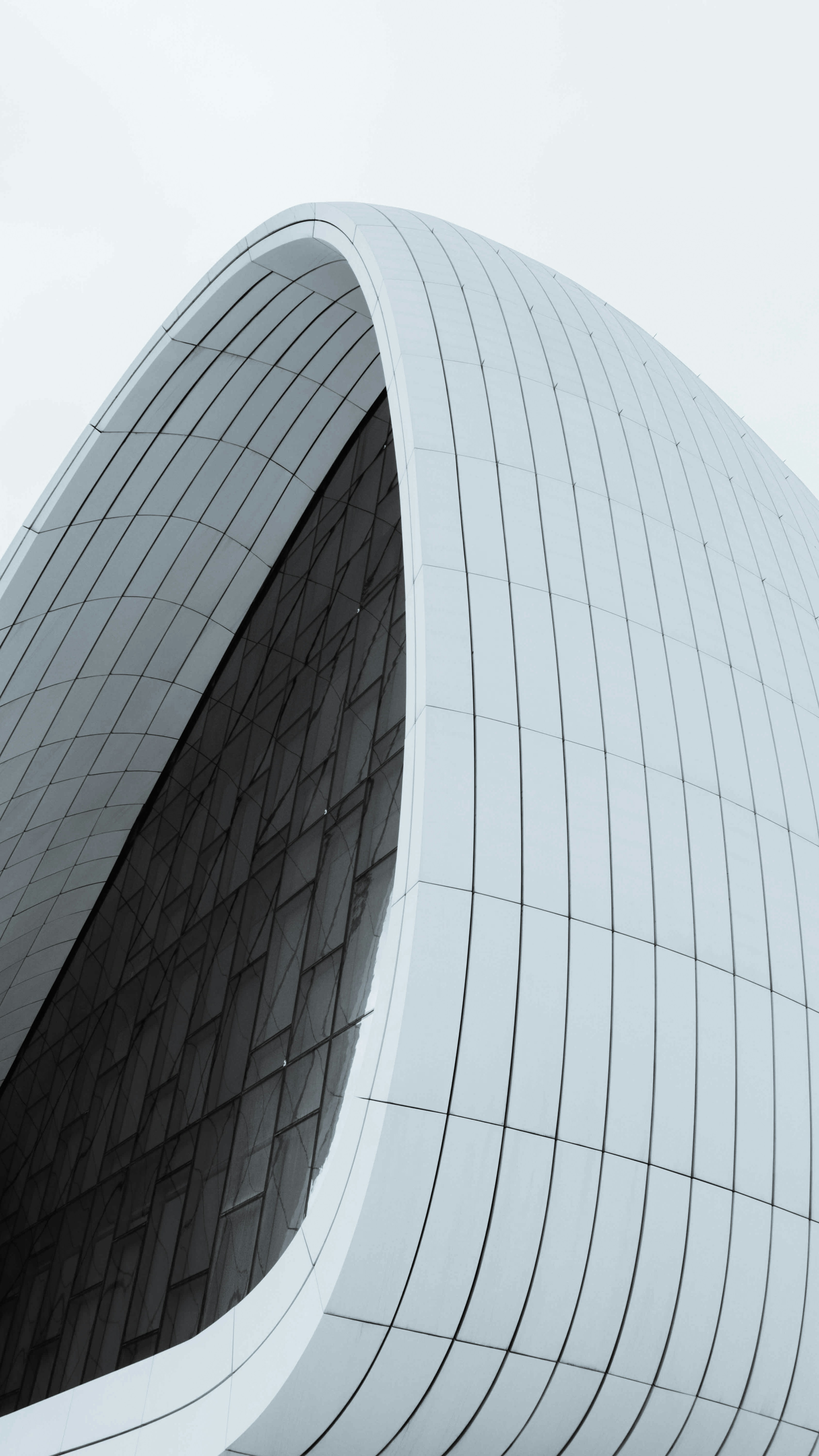 A large white building with a curved roof photo – Free Baku Image on ...
