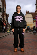 A man standing in the middle of a street