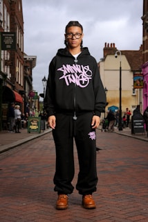 A man standing in the middle of a street