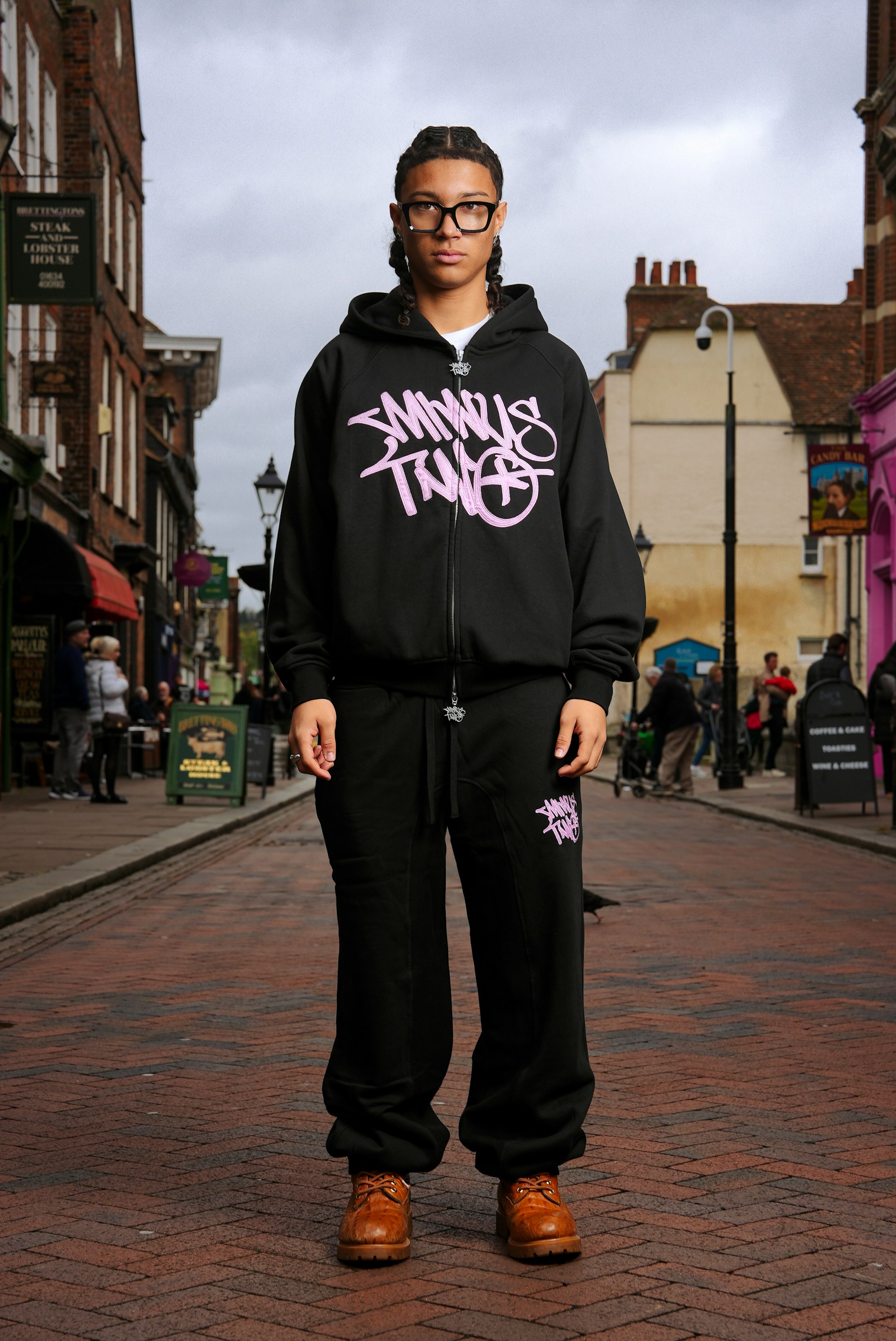 A man standing in the middle of a street