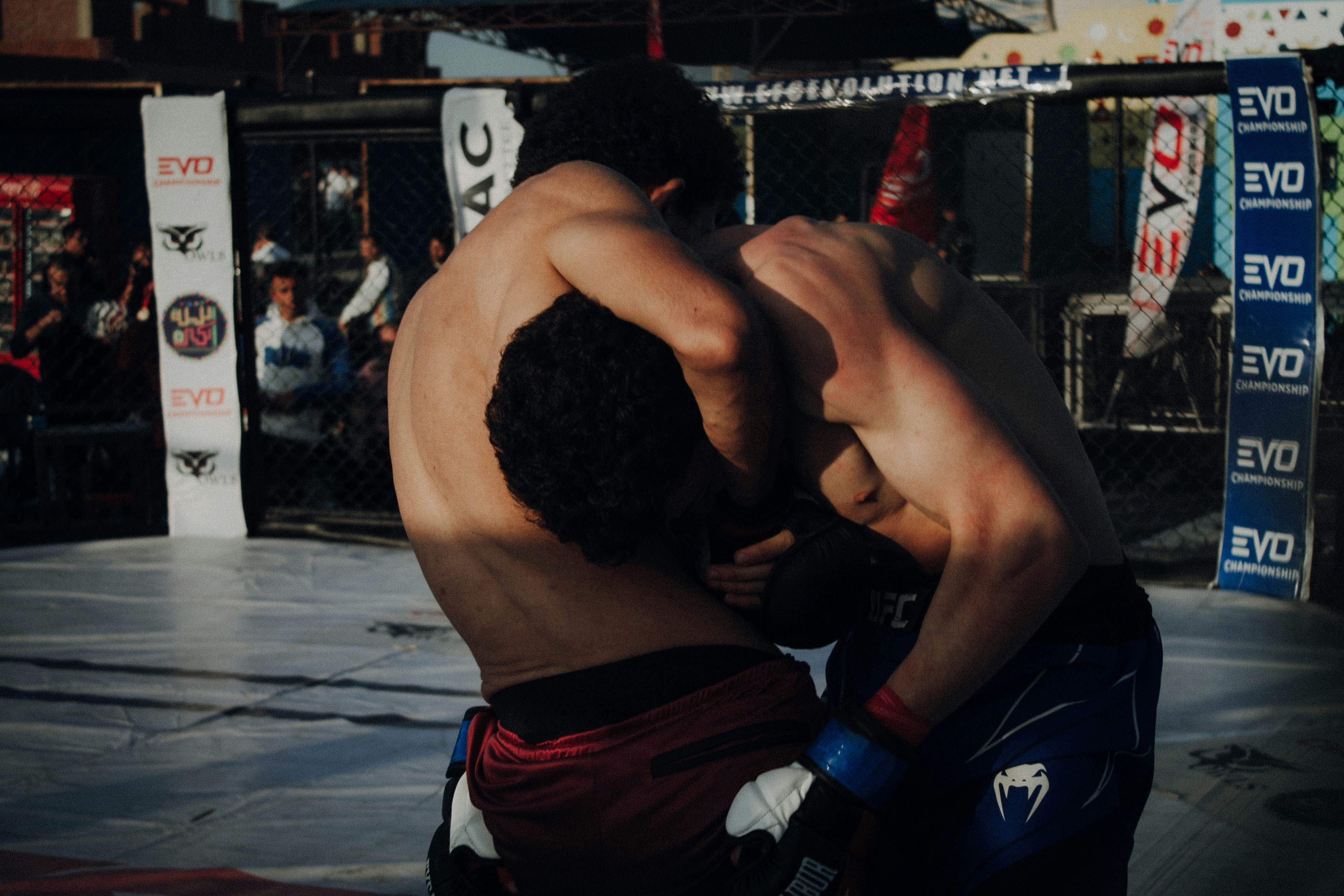 A couple of men standing next to each other