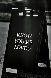 A sign that says know you're loved