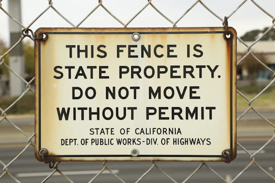 This fence is state property do not move without permit