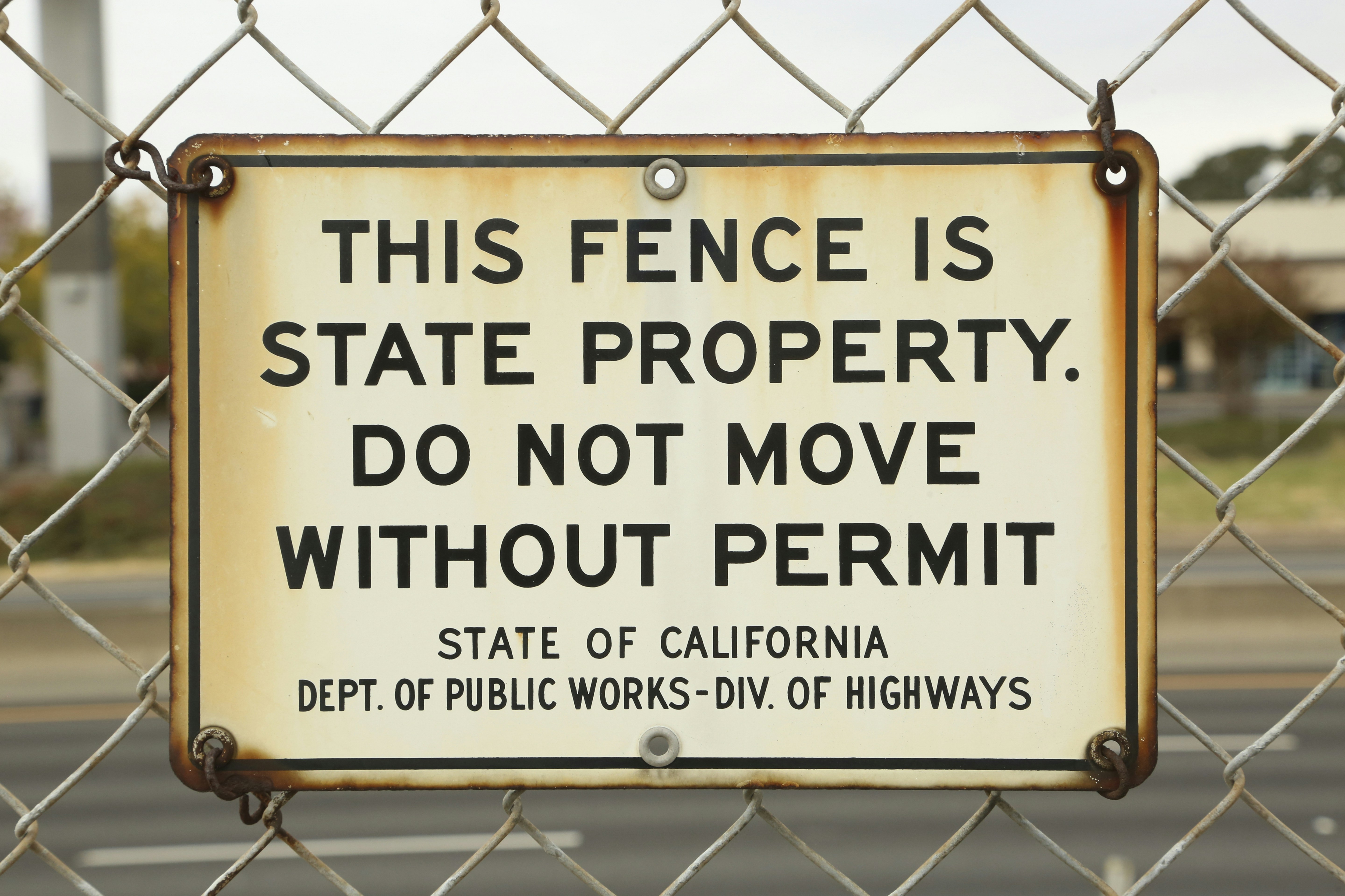 This fence is state property do not move without permit