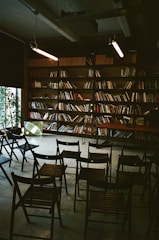 A room filled with lots of books and chairs