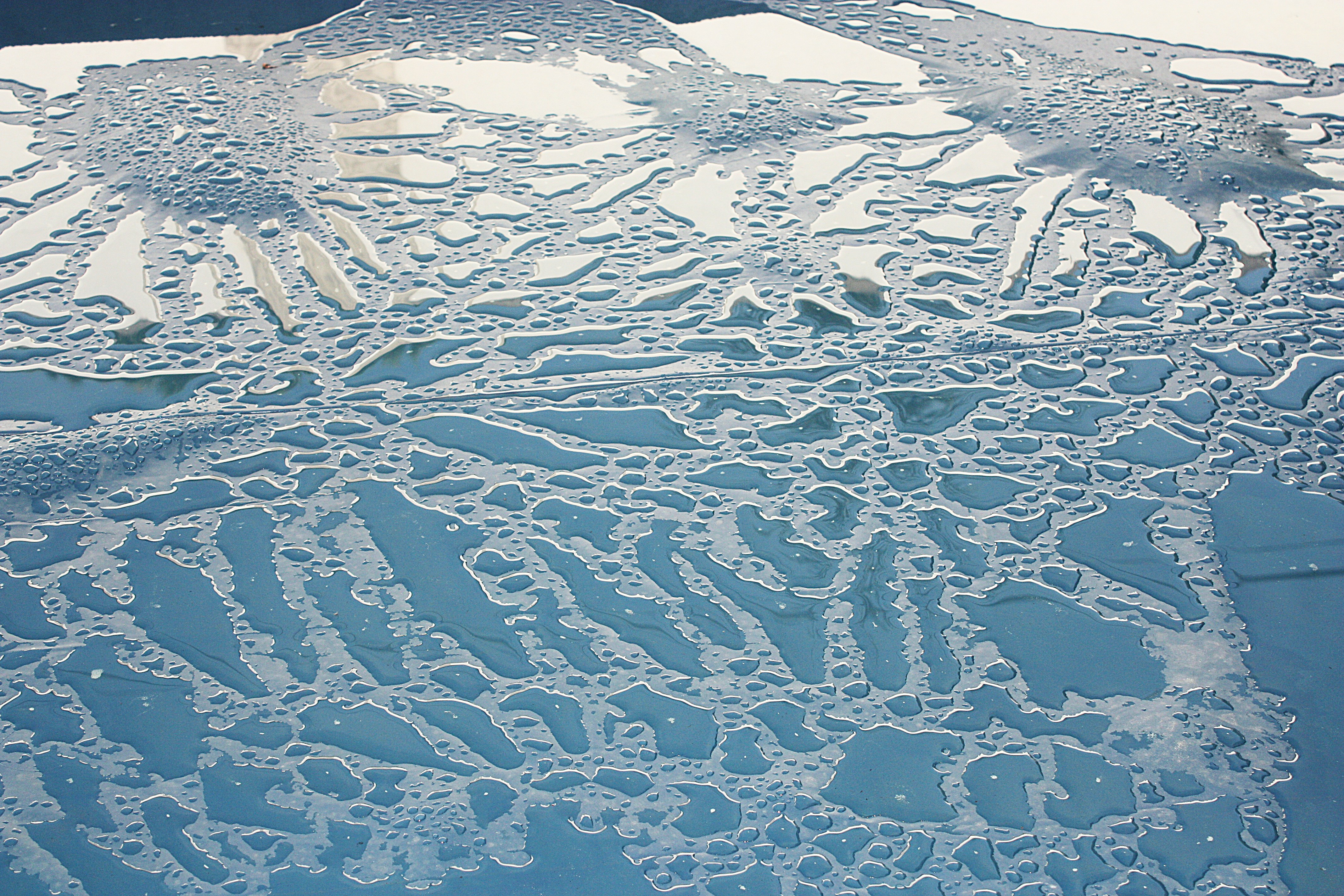 An ice floet is shown on the surface of the water