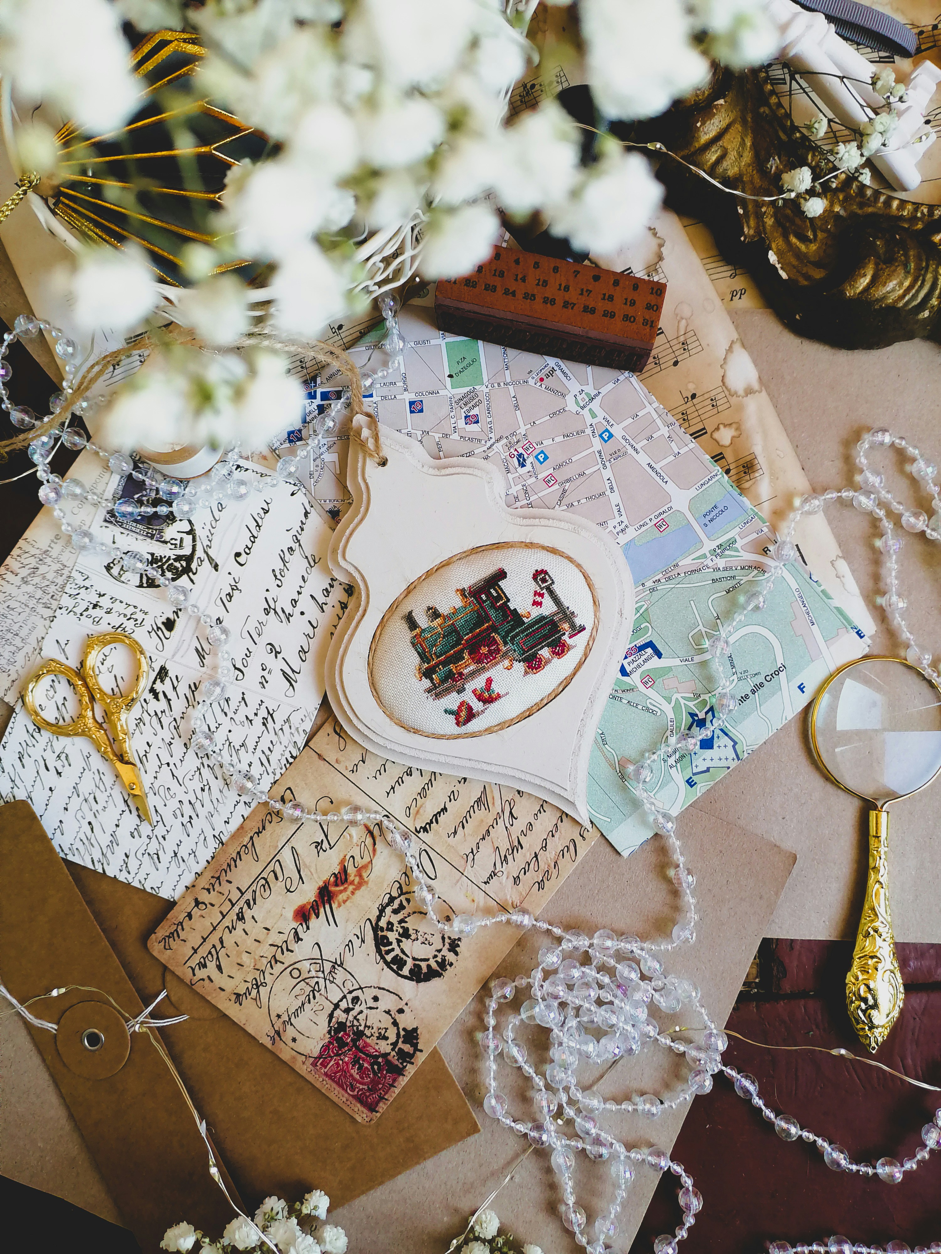 A table topped with lots of crafting supplies