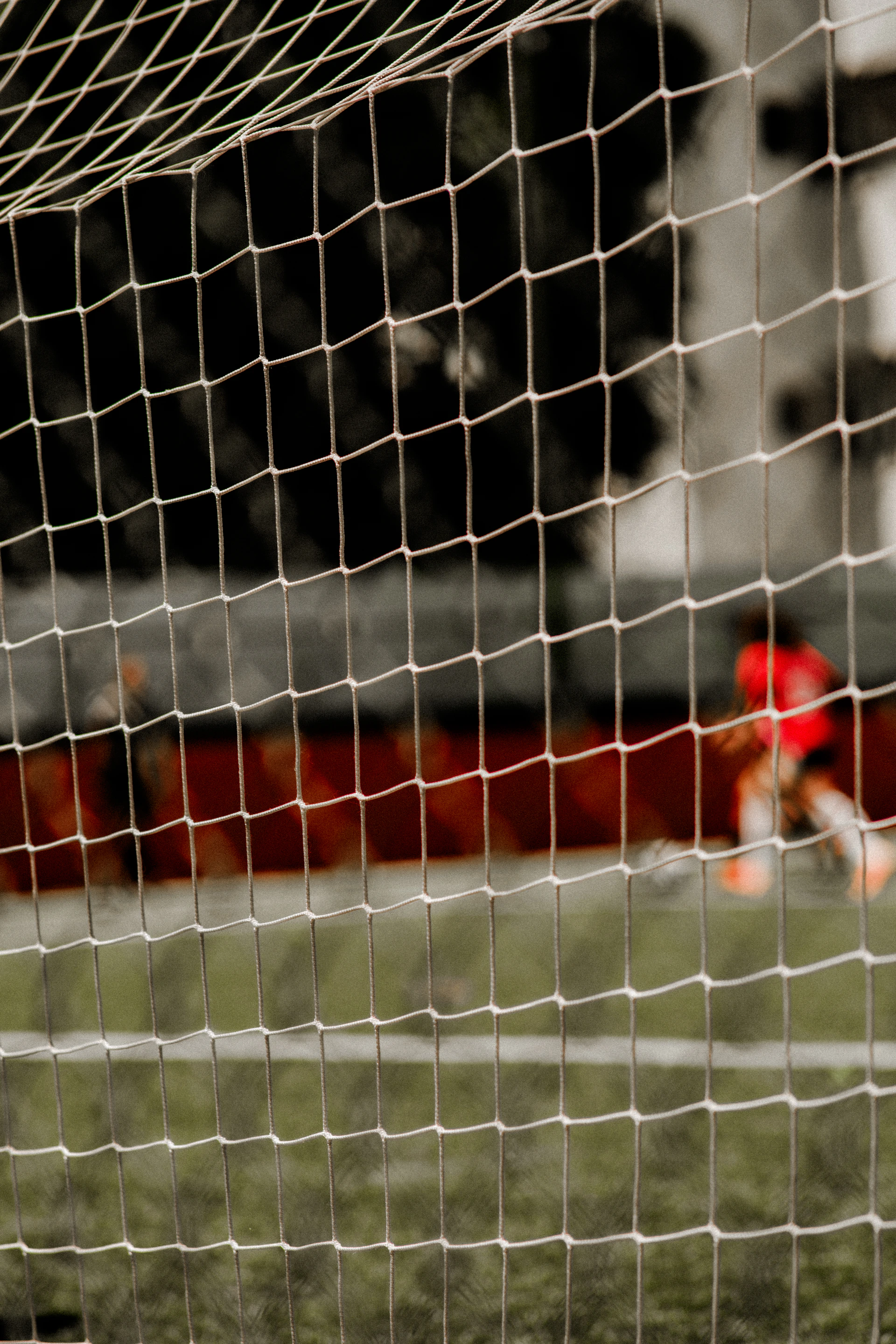 A close up of a soccer goal net